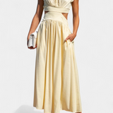 Minimalista Jocelyn Garais szett magas nyakkal és oldalsó nyitásokkal