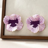 Geometrikus virág formájú fülbevalók