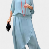 Két részes Maravilla folyékony szett, laza toppal és aszimmetrikus szoknyával