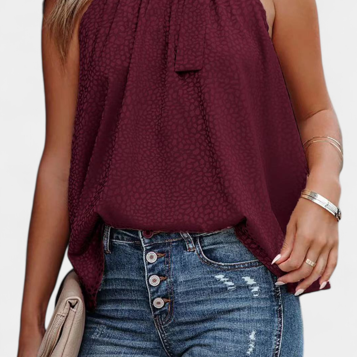 Adela | Ujjatlan leopárdmintás magas nyakú blúz masnival