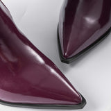 Műbőr csizmák csattal és hegyes orral