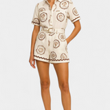 Tengerészeti kagylós és gombos póló