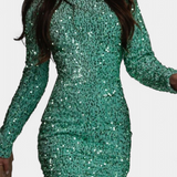 Adèle Garais téli estélyi ruha, hátul nyitott és csillogó