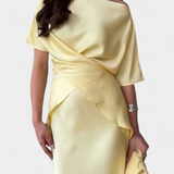 Top Veleda keresztpántos és könnyű szoknyával